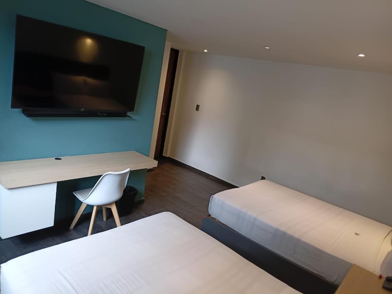 Habitación Cuádruple Deluxe